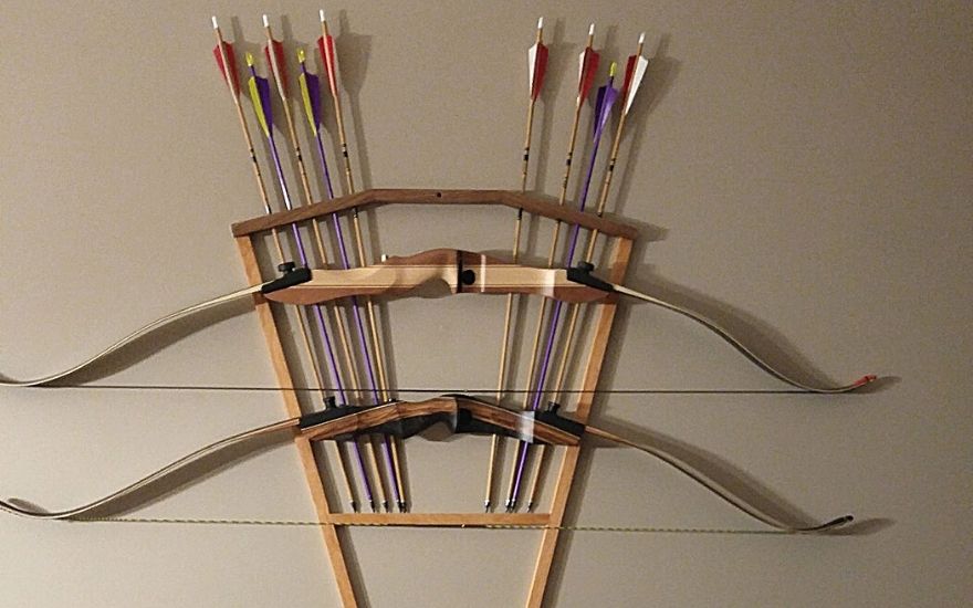 hanging a recurve bow on a wall